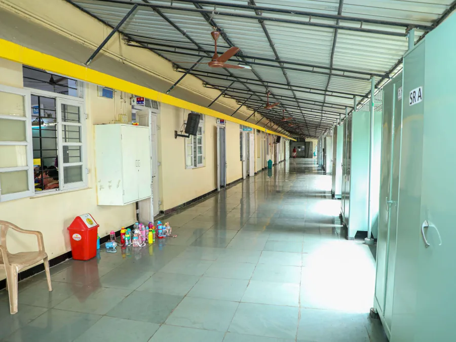 Pre-Primary corridor with classrooms and little water bottles lined up